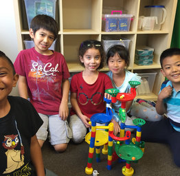 young students playing
